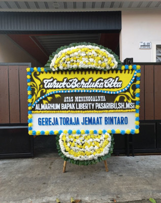 Papan Bunga Duka di Sorosutan